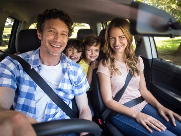 Family riding in a SUV