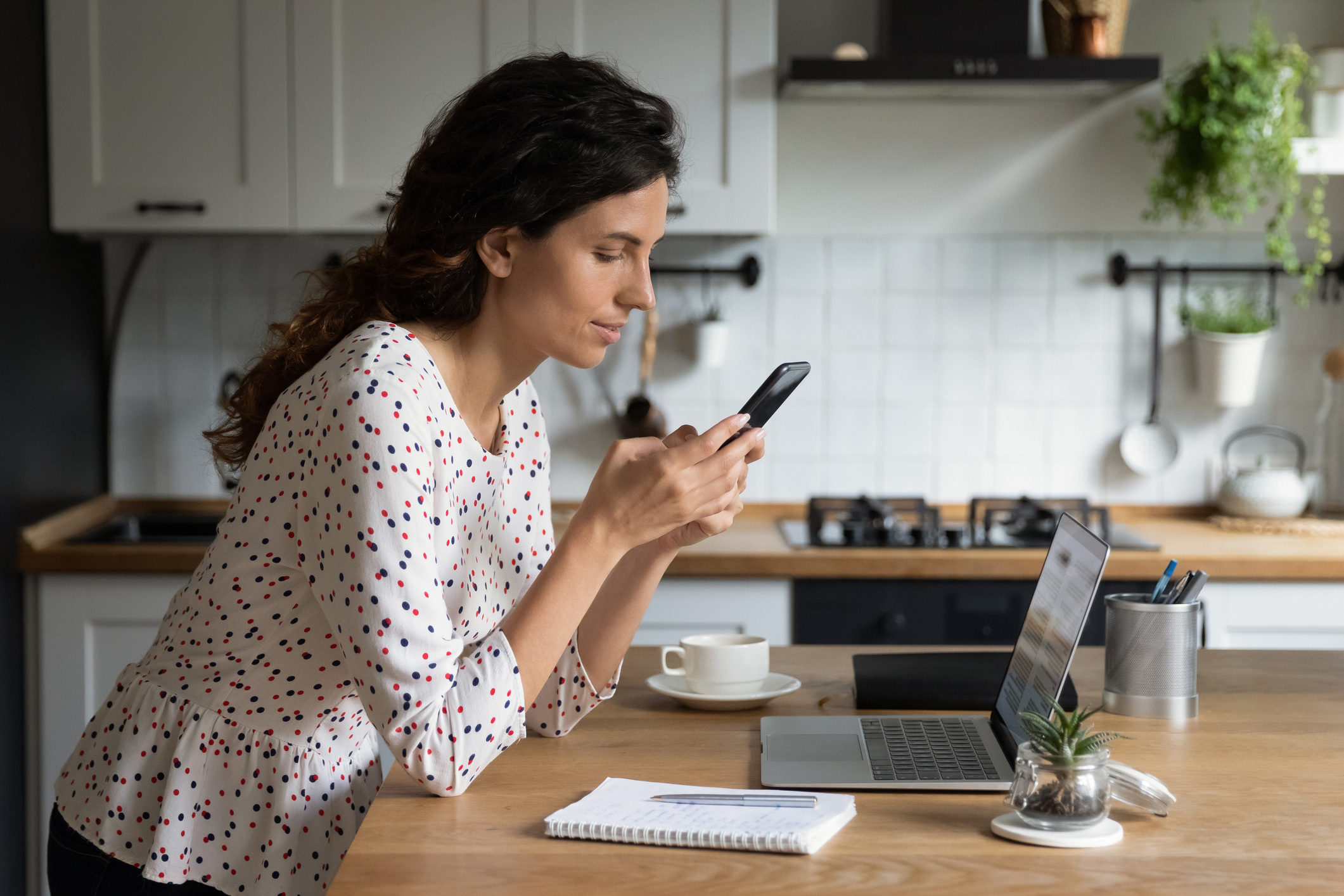 Woman on cell phone at home